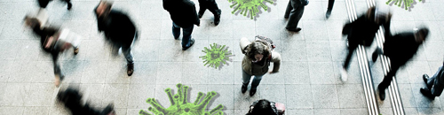 People walking in a public space, with viruses superimposed